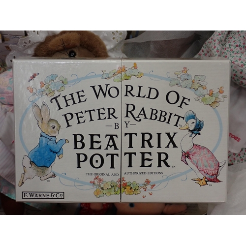 472 - A quantity of Beatrix Potter related items including soft toys, a set of books - The World of Peter ... 