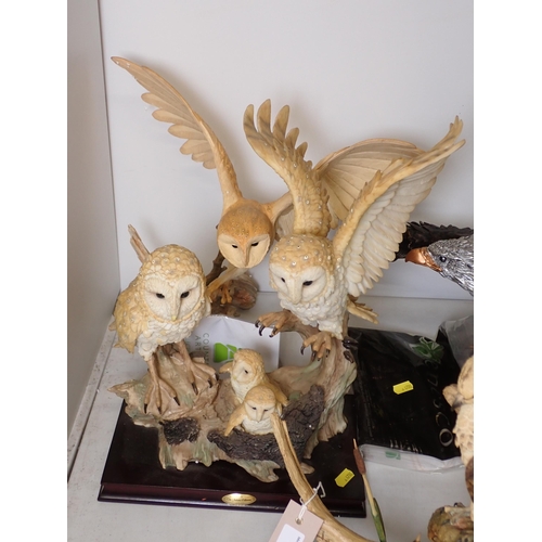 534 - A Country Artists Figure of an Osprey 15in H, two Figures of Barn Owls 16in H and a Figure of a Bald... 