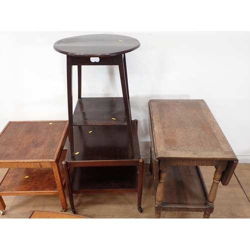 54 - An oak two tier Occasional Table, an Arts and Crafts circular Occasional Table, another two tier Occ... 