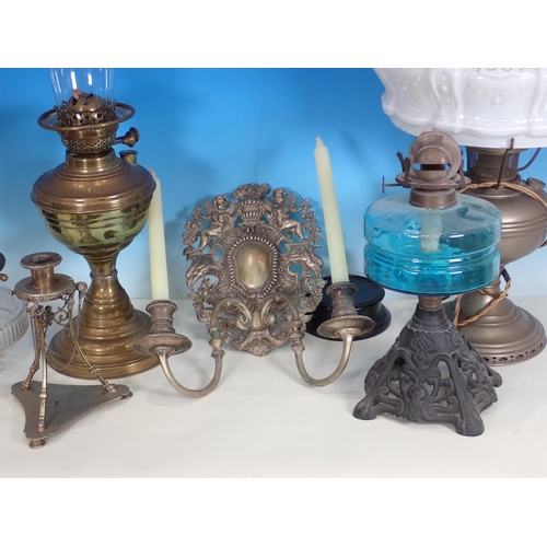 541 - Four Oil Lamps (failed PAT, no earth), a brass two branch Wall Sconce and an Empire style plated Can... 