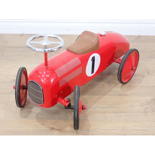 557 - A modern child's tinplate type push along Car