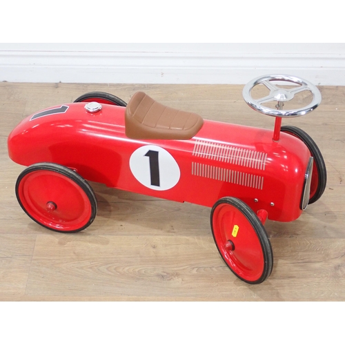 557 - A modern child's tinplate type push along Car