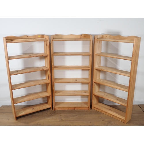 56 - Three modern pine open Bookcases 4ft H x 2ft W