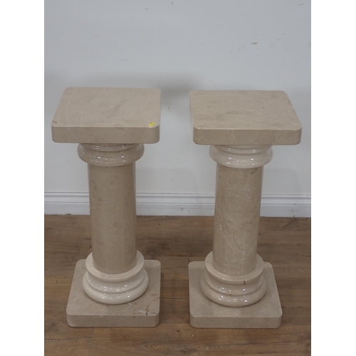 562 - A pair of marble Plant Stands with square tops 2ft 4in H x 12in W