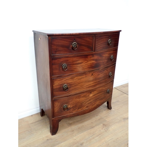 573 - A 19th Century mahogany bow fronted Chest of two short and three long drawers on splayed feet 3ft 11... 