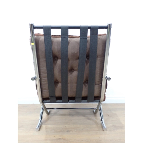 581 - A 20th Century Easy Chair with polished metal frame and brown upholstery