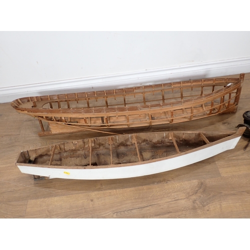 59 - Two part built wooden model Boats and three antique Bike Lamps including a Powell & Hamner