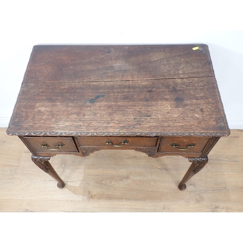 590 - An 18th Century oak Lowboy with later carving fitted three frieze drawers 2ft 5in W x 2ft 4in H