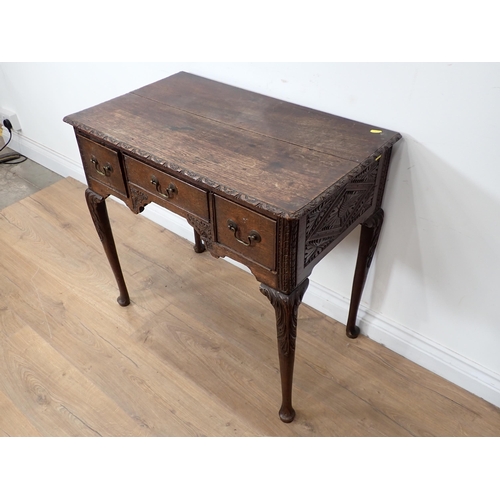 590 - An 18th Century oak Lowboy with later carving fitted three frieze drawers 2ft 5in W x 2ft 4in H