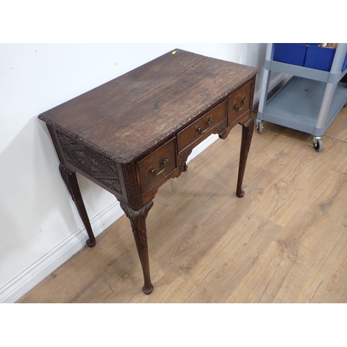 590 - An 18th Century oak Lowboy with later carving fitted three frieze drawers 2ft 5in W x 2ft 4in H