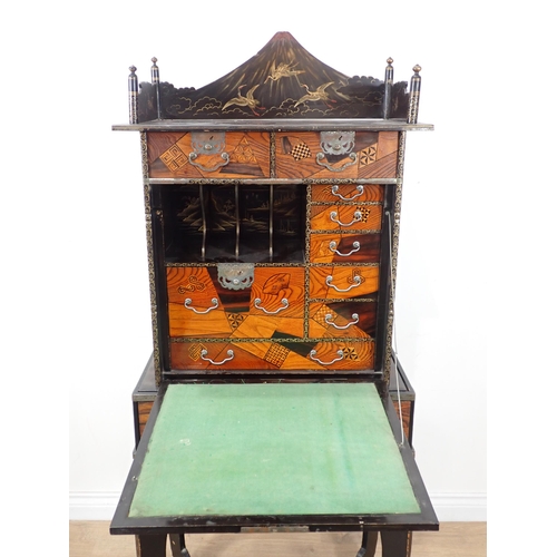 594 - A Chinese lacquered and parquetry effect Cabinet on stand 4ft 10in H x 2ft 1in W