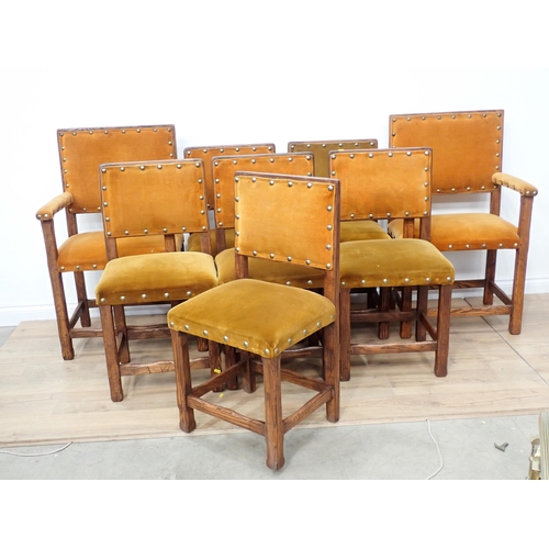 596 - A set of eight oak framed Dining Chairs with gold upholstery