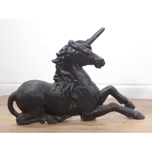 621 - An antique cast iron pair of large Boot Scrapers in the form of a Lion and Unicorn 2ft