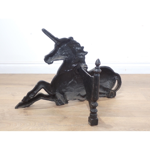 621 - An antique cast iron pair of large Boot Scrapers in the form of a Lion and Unicorn 2ft