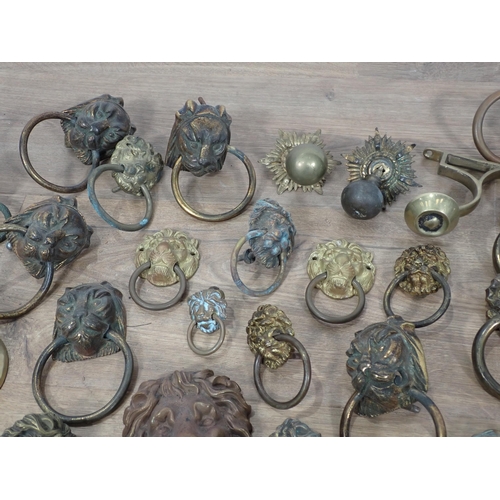 626 - Two boxes of brass and other Door Handles, Knockers, Picture Hooks, etc.