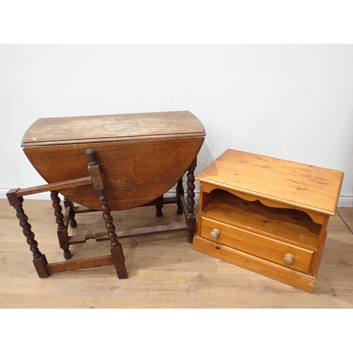 63 - An oak barley twist drop leaf Table A/F and a pine TV Stand