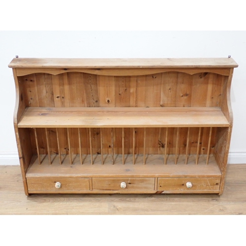 64 - A pine Plate Rack fitted three drawers 4ft W x 2ft 8in H