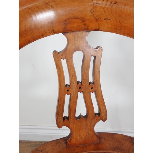 659 - A Victorian ash swivel Office Chair with pierced splat back