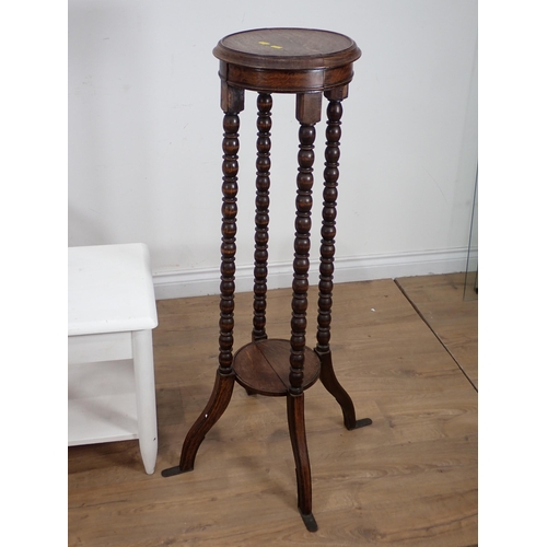 661 - An oak Plant Stand on bobbin turned supports, a wicker Chair, a white painted Coffee Table, a modern... 