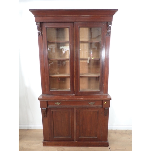 665 - A 19th Century mahogany veneered Bookcase with glazed upper section above cupboard base 6ft 6in H x ... 