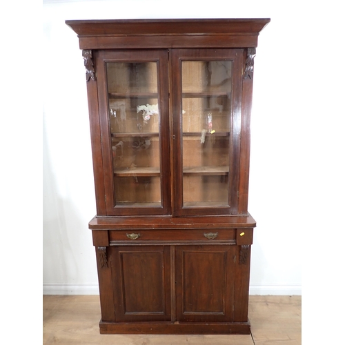 665 - A 19th Century mahogany veneered Bookcase with glazed upper section above cupboard base 6ft 6in H x ... 