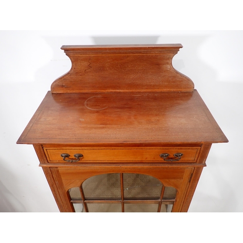 666 - An Edwardian mahogany and inlaid Display Cabinet fitted single drawer mounted upon cabriole supports... 