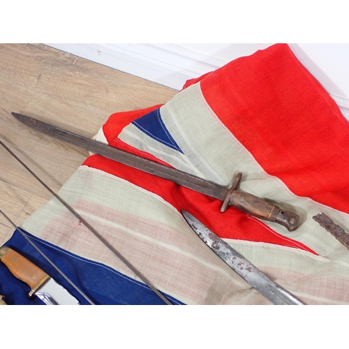 668 - A Bayonet, Kukri, 19th Century part Officer's Sword, various reproduction Swords and a Union Jack