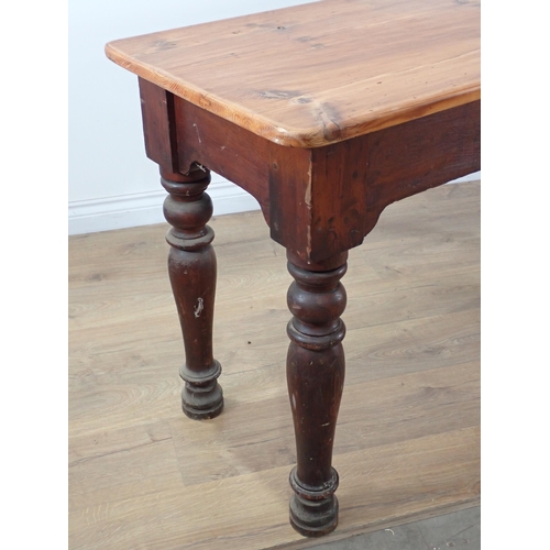 670 - A Victorian scrub top pine Serving Table on stained base with six turned supports 7ft 8in L x 2ft 6i... 