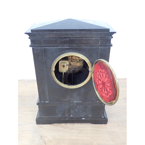 69 - A Victorian black slate Mantle Clock with gilt Corinthian columns and brass embossed panel of classi... 