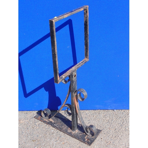 703 - A large metal Lantern with glass panels supported on a bracket, 33in H