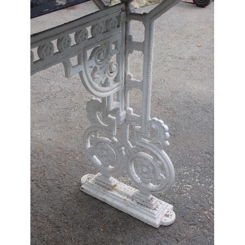 711 - A white painted cast iron Table Base with slate top, 4ft W x 2ft 5in H