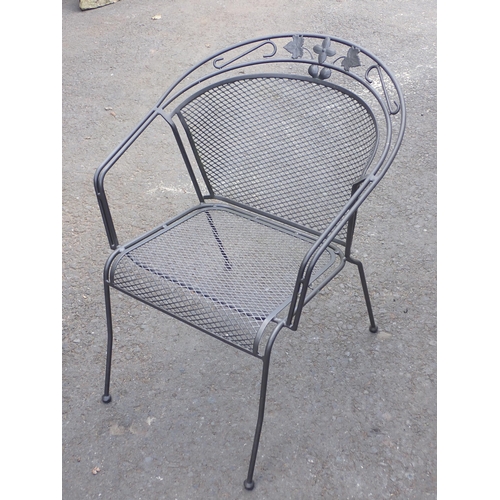 713 - A metal Garden Table  and four Chairs