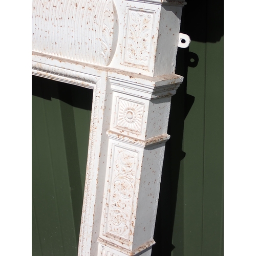 716 - A white painted cast iron Fire Surround with marble hearth