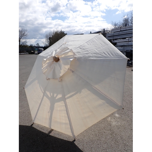 724 - A large Parasol and stand