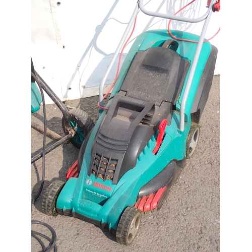 727 - A Bosch Garden Shredder, a Bosch electric Lawn Mower, a lawn Aerator, a fertilizer Spreader and a Sp... 