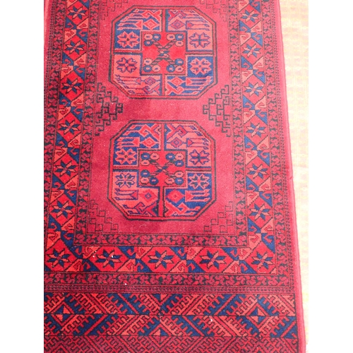 737 - A pink ground Oriental Rug 5ft 6in L x 4ft W and a red ground Runner 9ft 2in L x 2ft 3in W