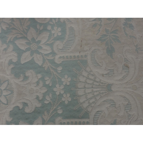 738 - A cream and pale green ground Carpet with floral design 9ft 6in L x 6ft 4in W