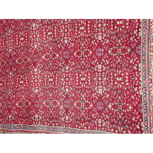 739 - A red ground Rug with intricate floral decoration within cream border 7ft L x 4ft 10in W and a red g... 