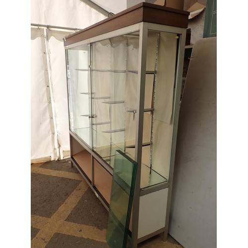 750 - A large glass Shop Display Cabinet 6ft 3in H x 6ft 2in W