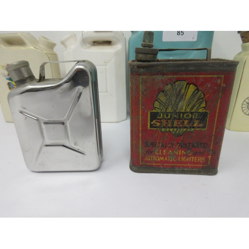 85 - A small Junior Shell Oil Can, four ceramic and one miniature Jerry Cans