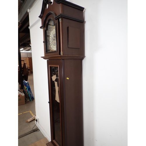 9 - A reproduction Longcase Clock with arched brass dial marked ECS Westminster, Germany, and having gla... 