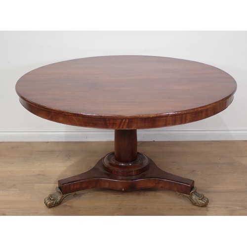 359 - A 19th Century mahogany Breakfast Table with tilting circular top on turned column, the triform base... 