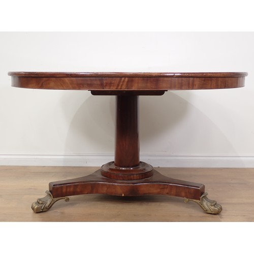 359 - A 19th Century mahogany Breakfast Table with tilting circular top on turned column, the triform base... 