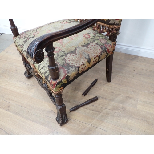 569 - A Victorian mahogany framed open Armchair and a mahogany framed Carolean style Armchair