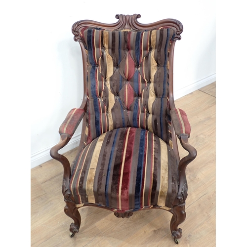 569 - A Victorian mahogany framed open Armchair and a mahogany framed Carolean style Armchair