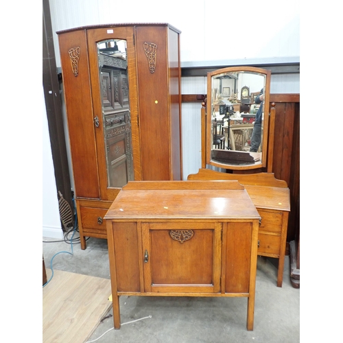 676 - An oak Bedroom Suite of single mirror door Wardrobe, Dressing Chest and Cupboard