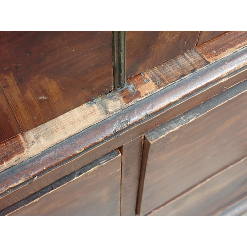 677 - A 19th Century mahogany veneered Linen Press lacking cornice fitted two short and one long drawer to... 