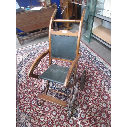 756 - A Victorian folding Push Chair