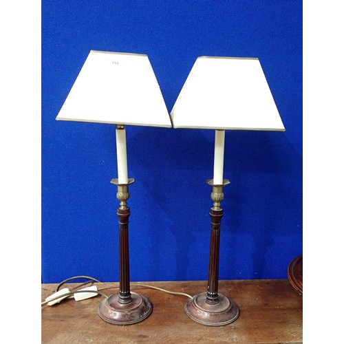 755 - A pair of turned mahogany Table Lamps with brass mounts and fluted columns, 2ft 2in H, (passed PAT)