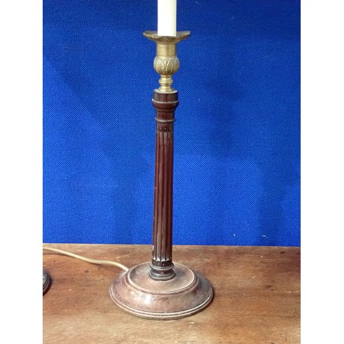 755 - A pair of turned mahogany Table Lamps with brass mounts and fluted columns, 2ft 2in H, (passed PAT)